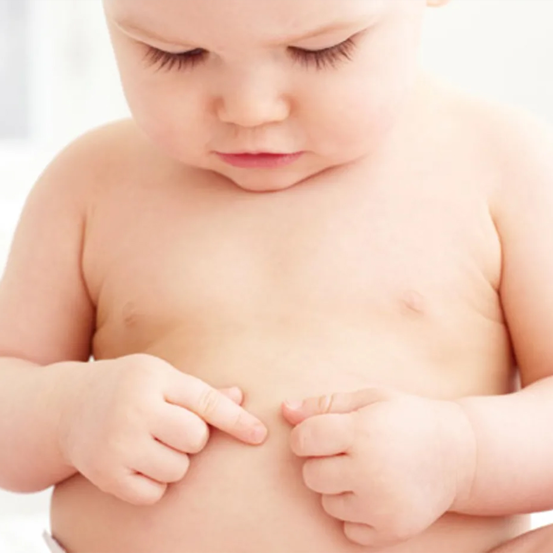 Banner baby touching belly