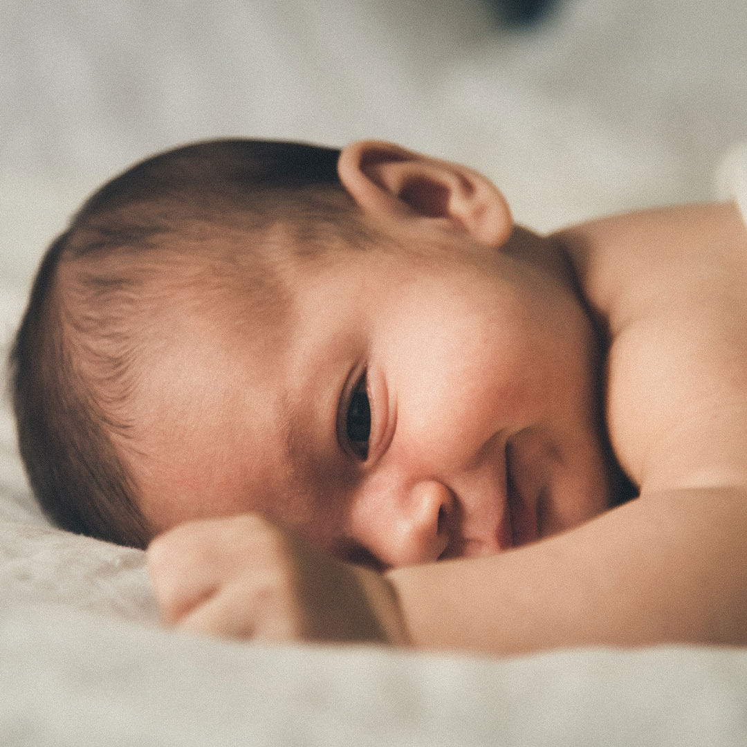 Banner newborn lying down