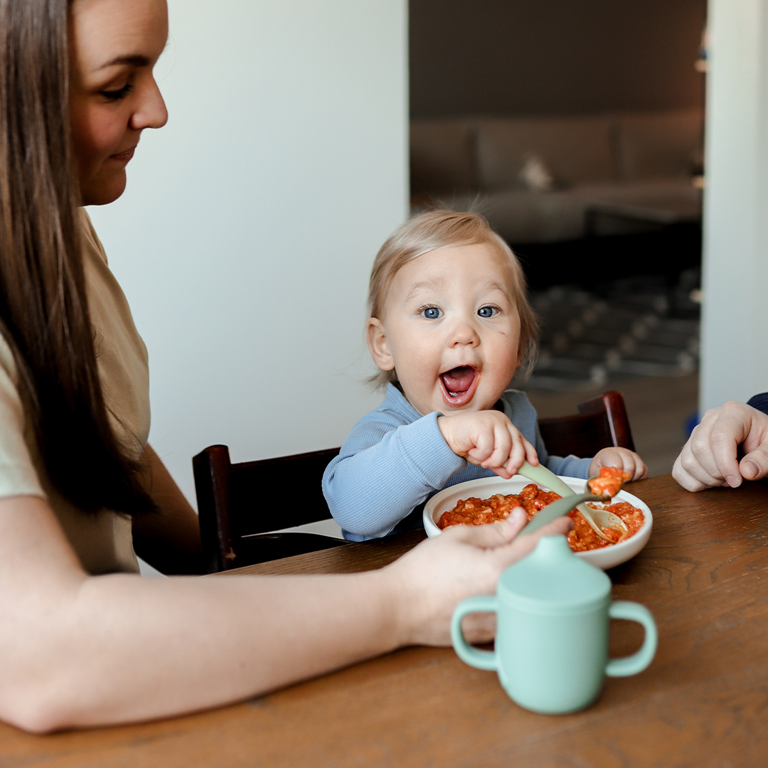 Happy child eating