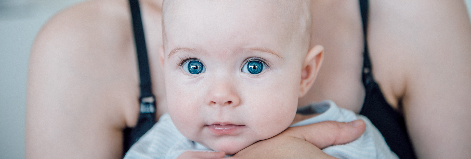 Baby with big blue eyes